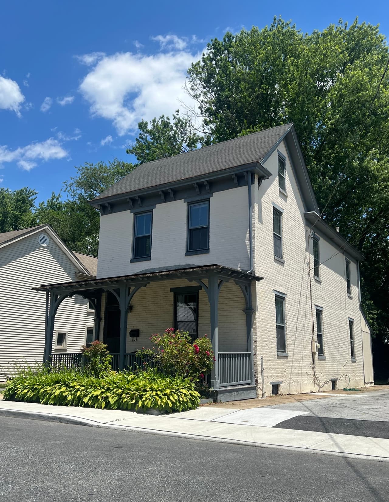 Front exterior of 34 Choate Street viewed from the driveway.